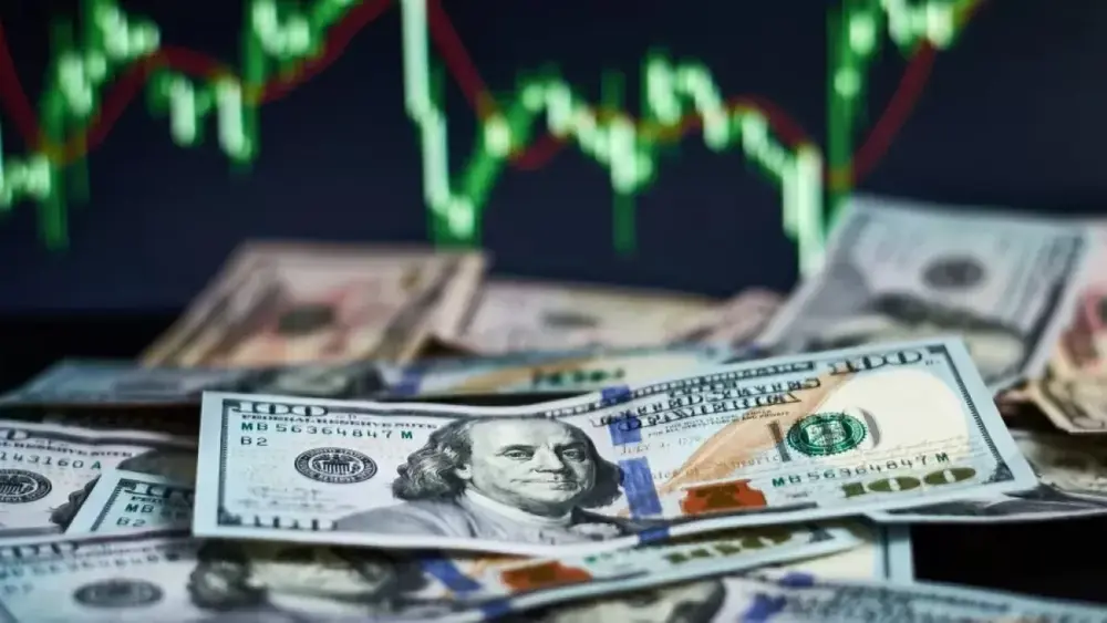 Dólar cai após Copom cortar juros para 14% ao ano